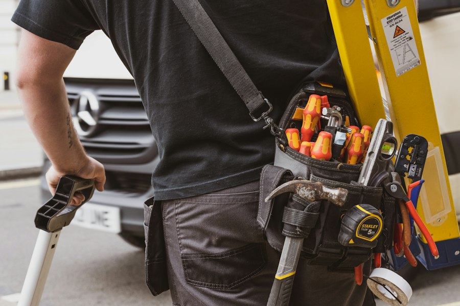 A contractor wearing a tool belt